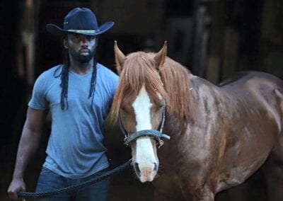 Jadon Relaford next to Horse